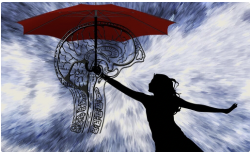 Umbrella, brain, woman showing resiliency